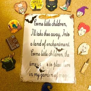 Hocus Pocus decor a tin picture a wood garland and hocus Pocus stickers